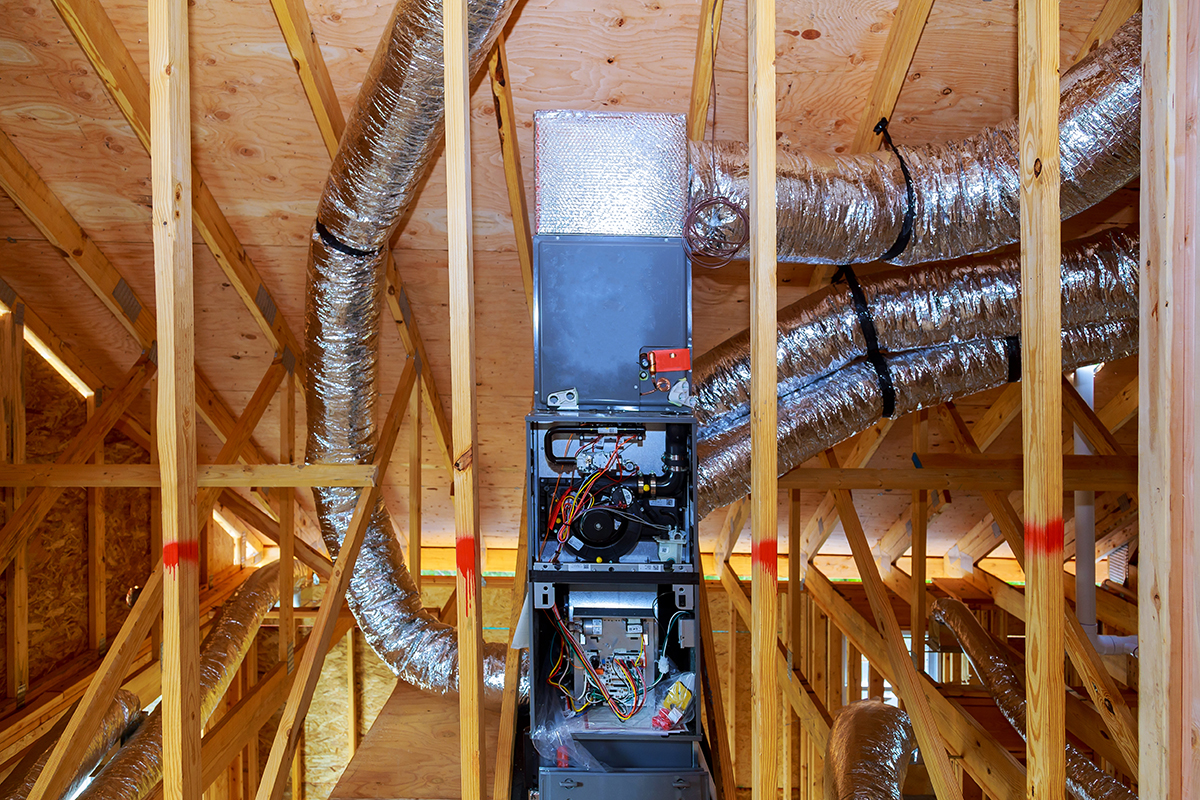 installation of heating system on the roof of the pipe system of heating closeup